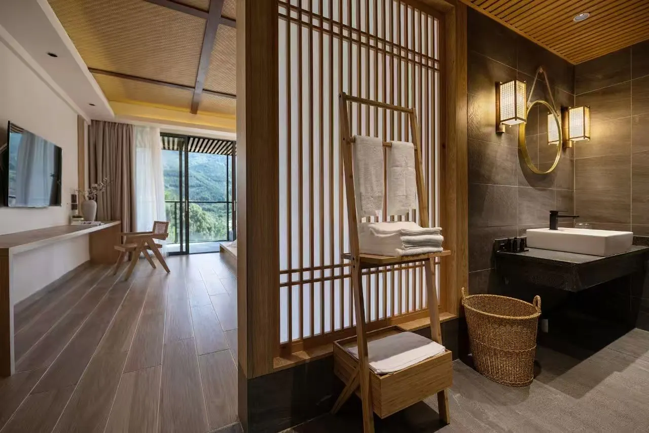 Coordinated window furnishings and interior finishes across a composed residential suite