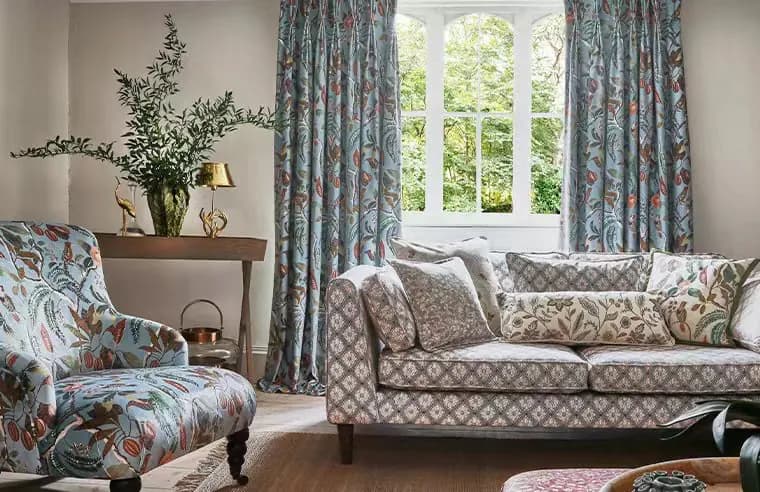 Patterned upholstered furniture in a refined indoor setting