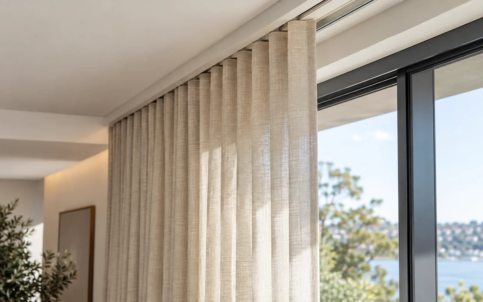 Concealed curtain track aligned cleanly with an architectural ceiling recess