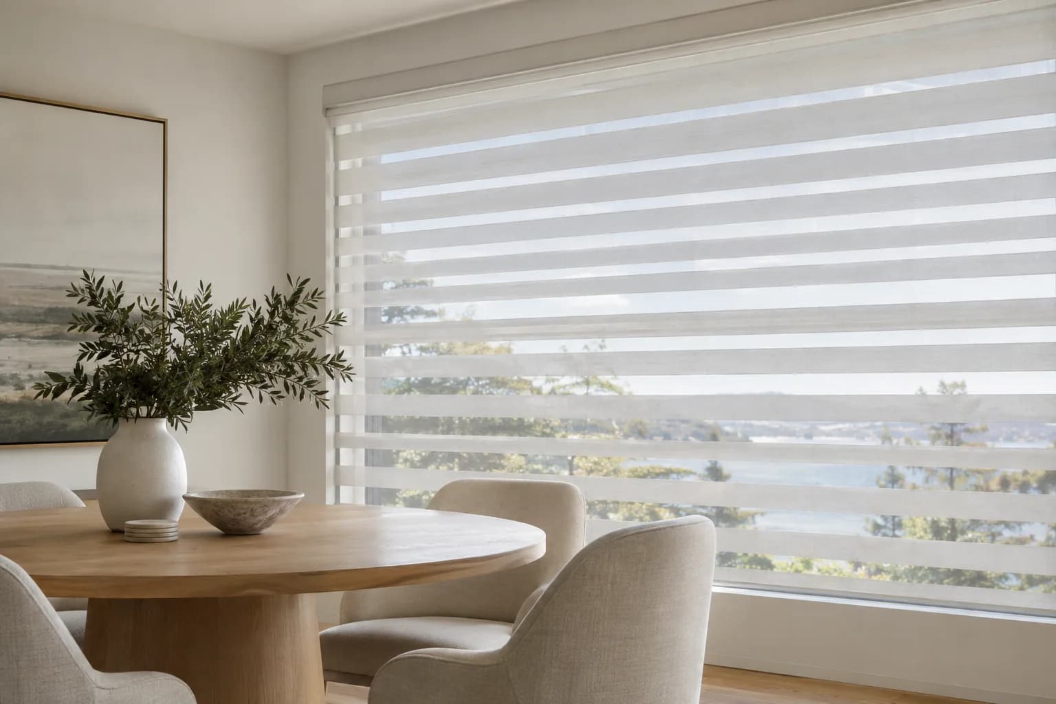 Sheer-vane shades filtering daylight in a living room