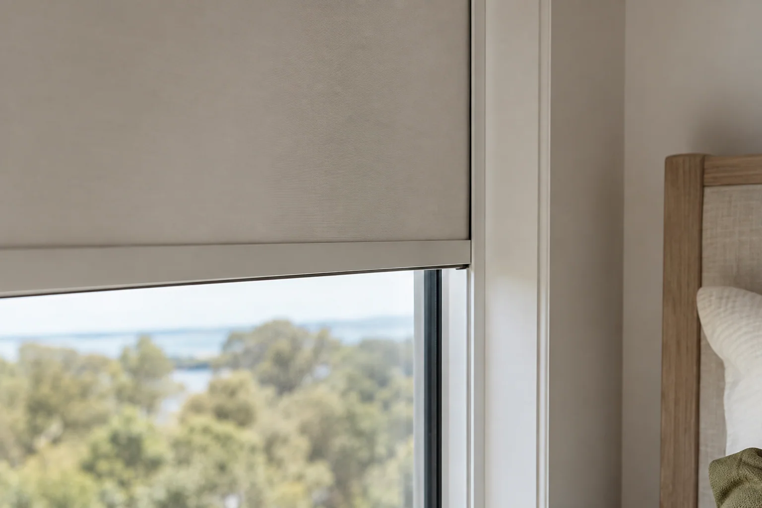 Close view of a roller blind edge and window reveal relationship