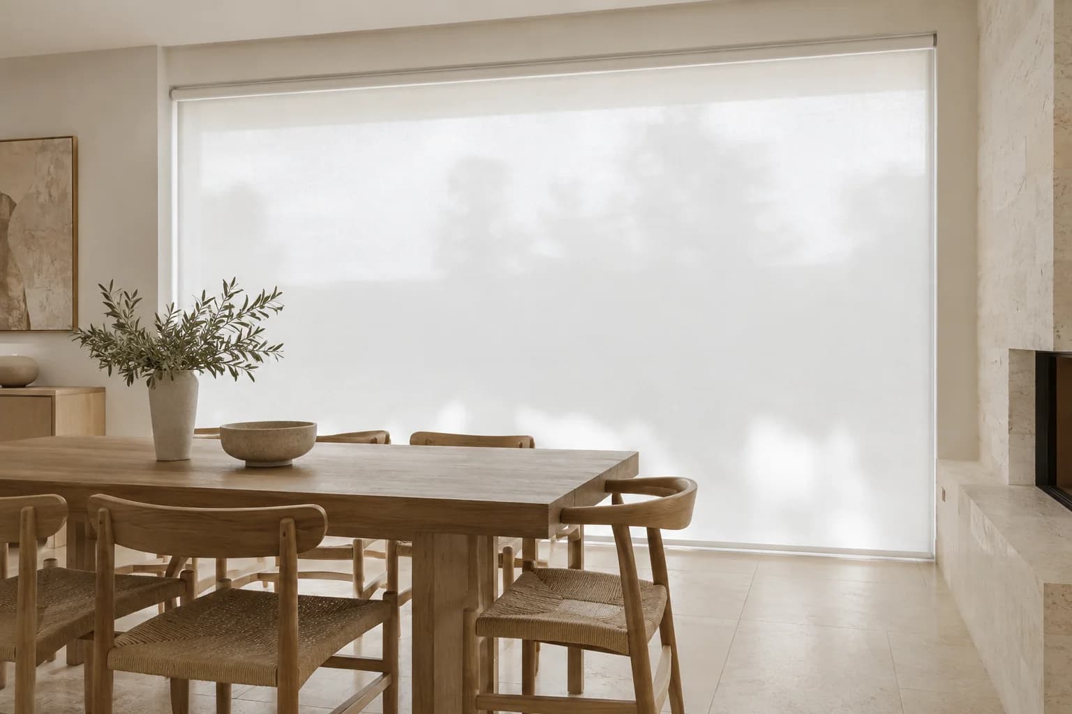 Light-filtering roller blind installed across a contemporary Sydney dining-room window