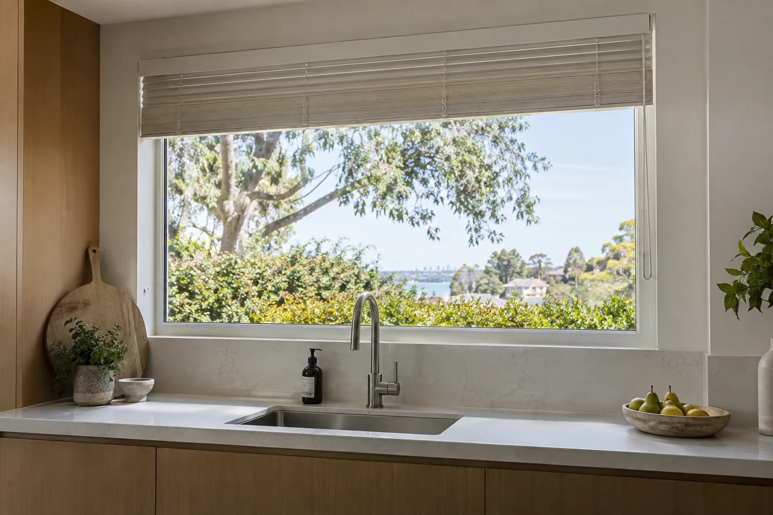 Partly raised Venetian blind showing its compact slat stack
