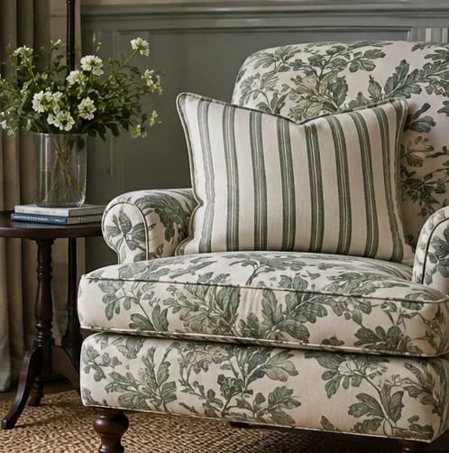 Botanical armchair with a tailored striped cushion