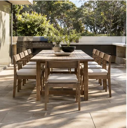 Outdoor dining setting with fitted seat pads