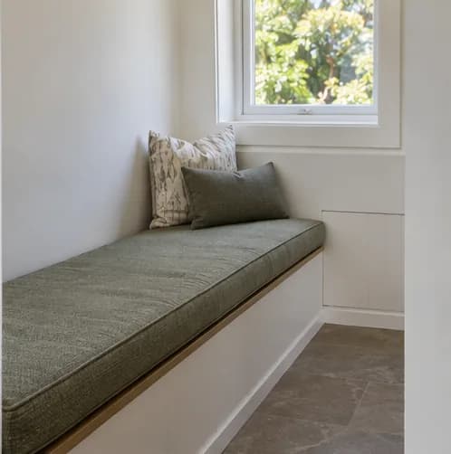 Custom fitted cushion on a long window seat