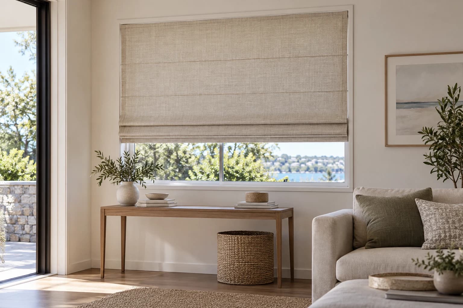 Textured Roman blind above a console in a contemporary Australian living room.