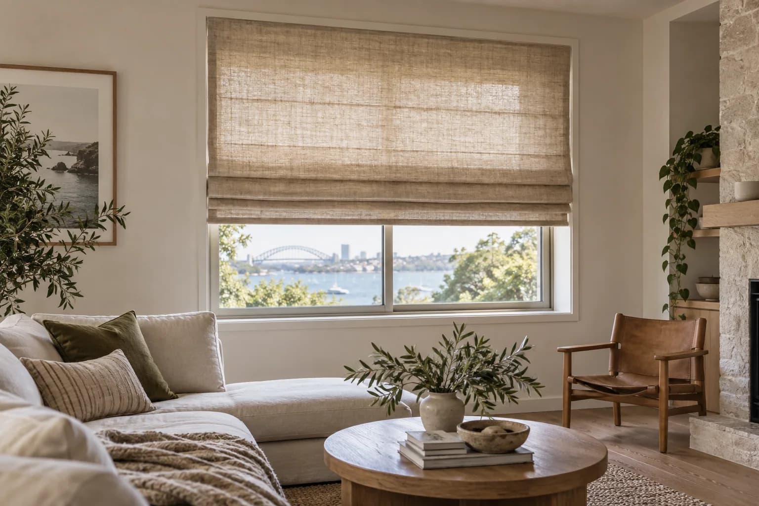 Natural linen Roman blind filtering daylight in a Sydney living room