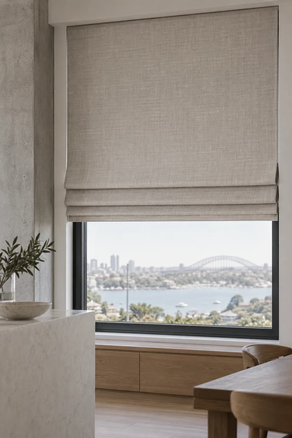 Pale linen-blend Roman blind with a clean controlled fold