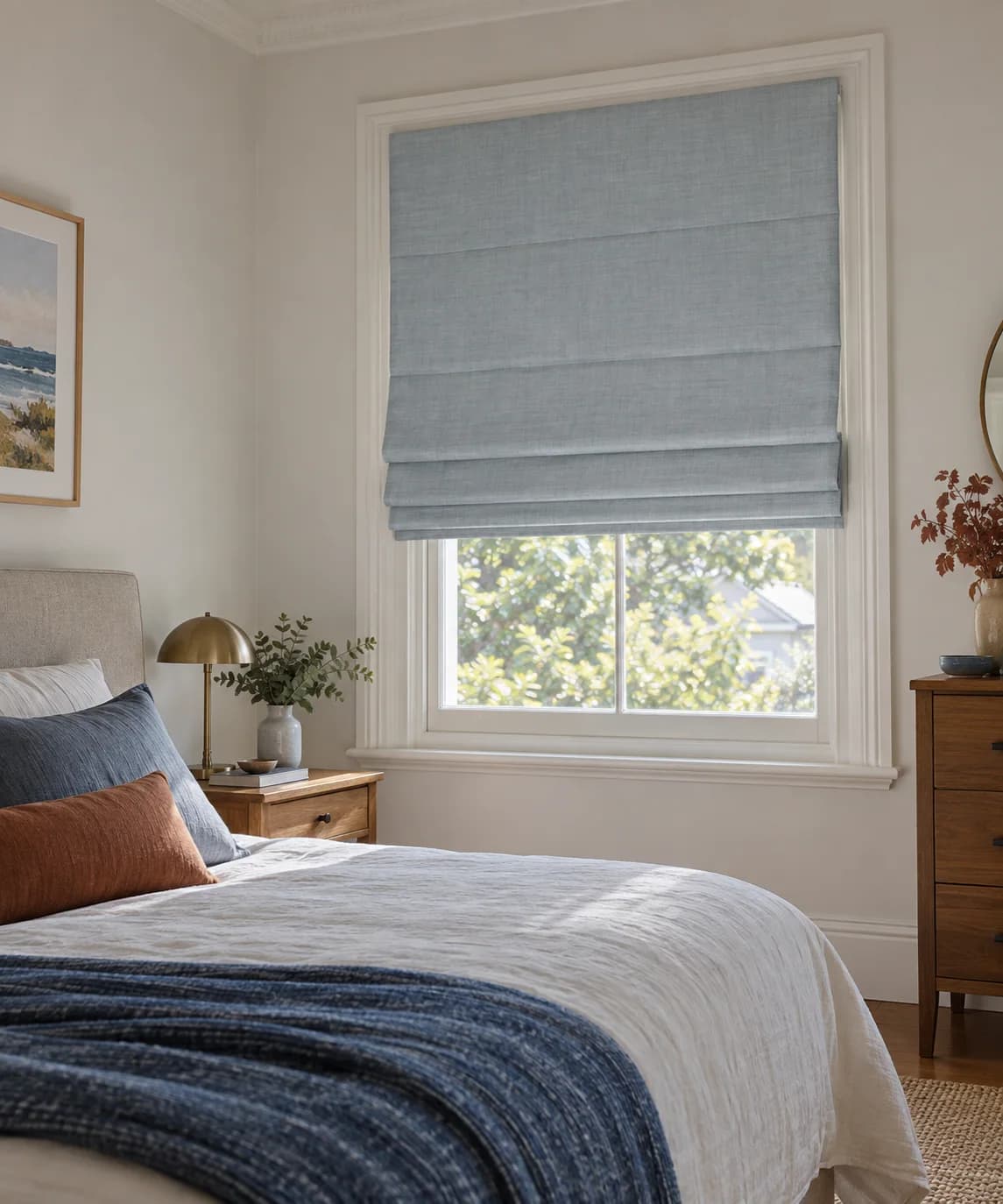 Blue-grey linen Roman blind in a Sydney bedroom