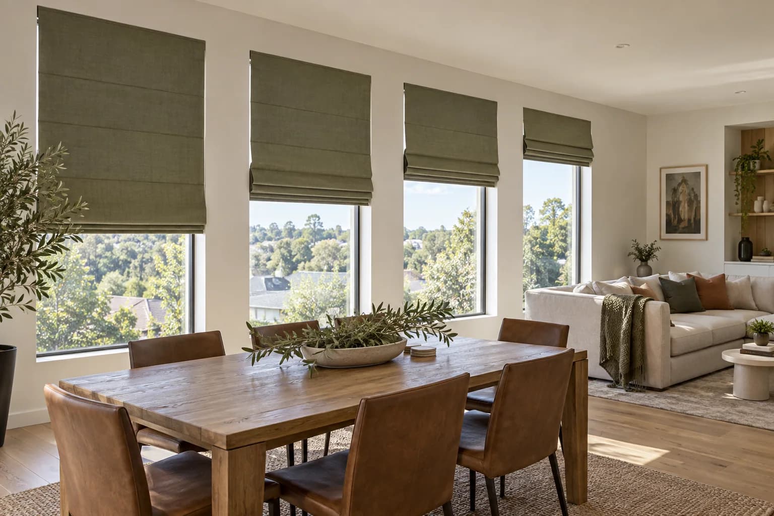 Multiple motorised Roman blinds aligned across one living-room elevation