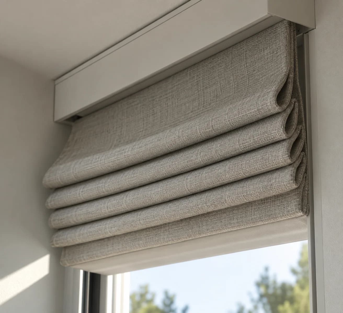 Close view of the raised fold stack on a motorised Roman blind