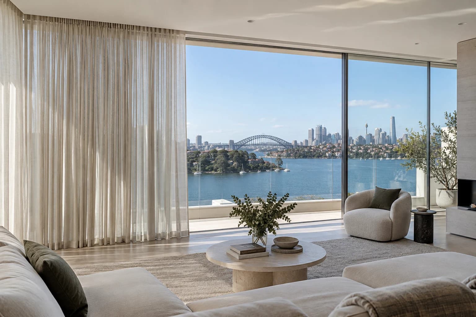 Large layered curtains with discreet motorised track in a residential room