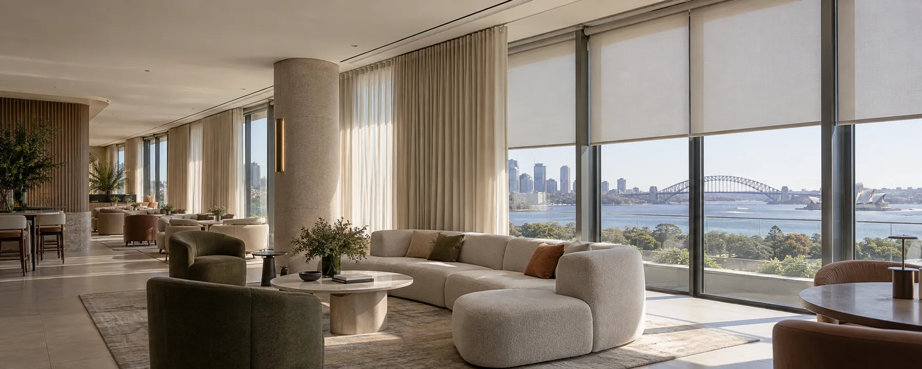 Architectural interior with coordinated curtains and roller blinds