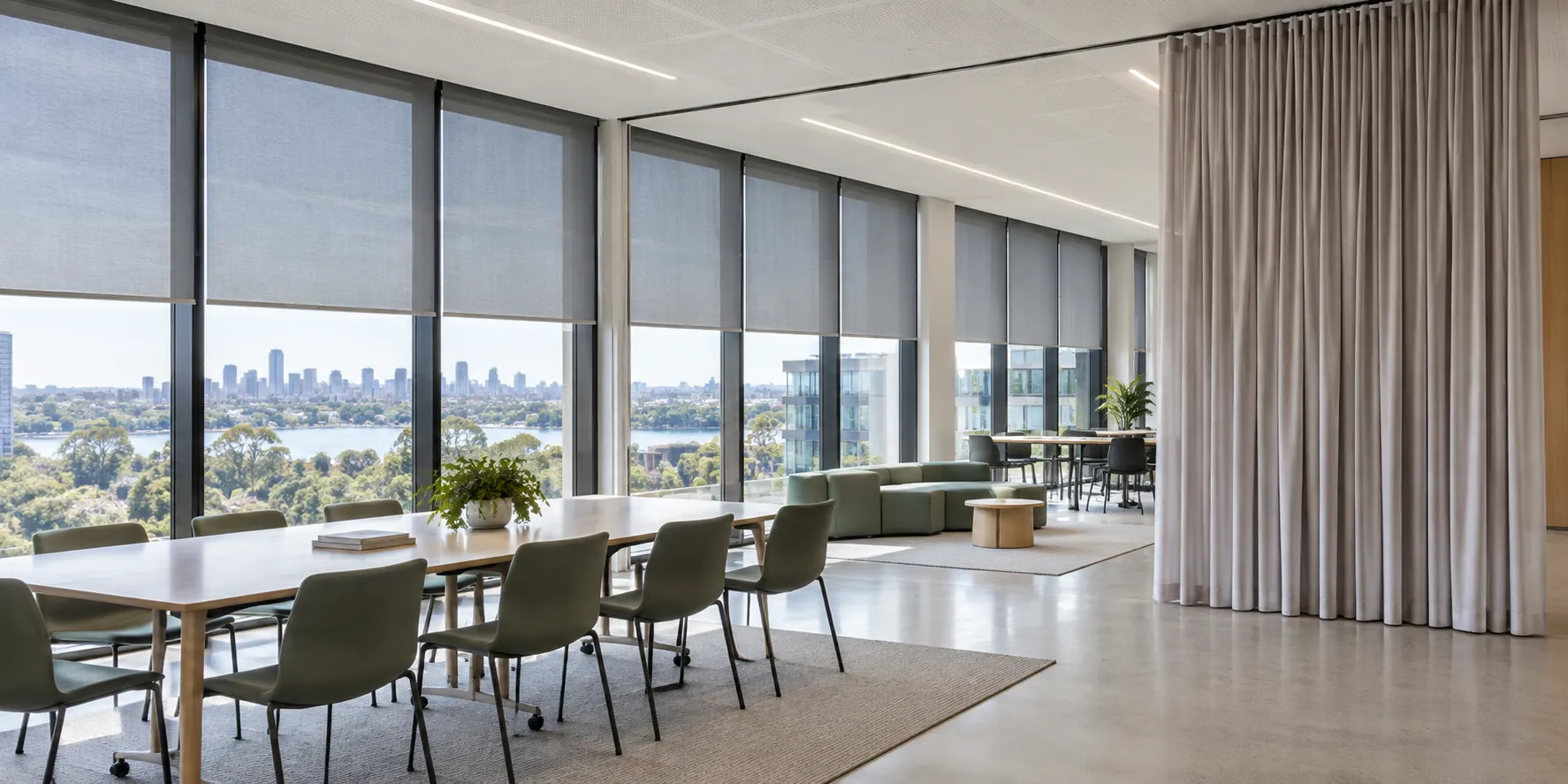 Commercial window furnishing installation with curtains and blinds
