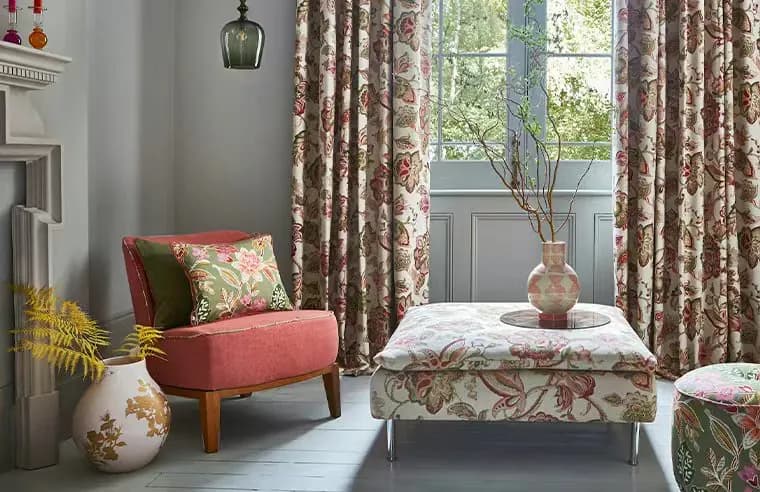 Backlit textured sheer curtains forming an even wave beside a dining setting