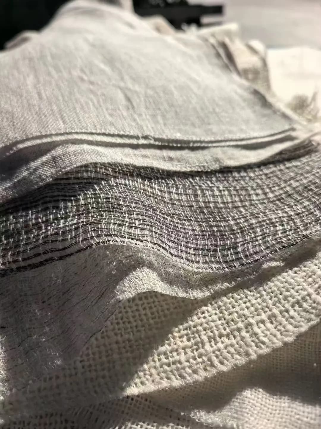 Close view of furnishing textiles showing different weights and woven structures