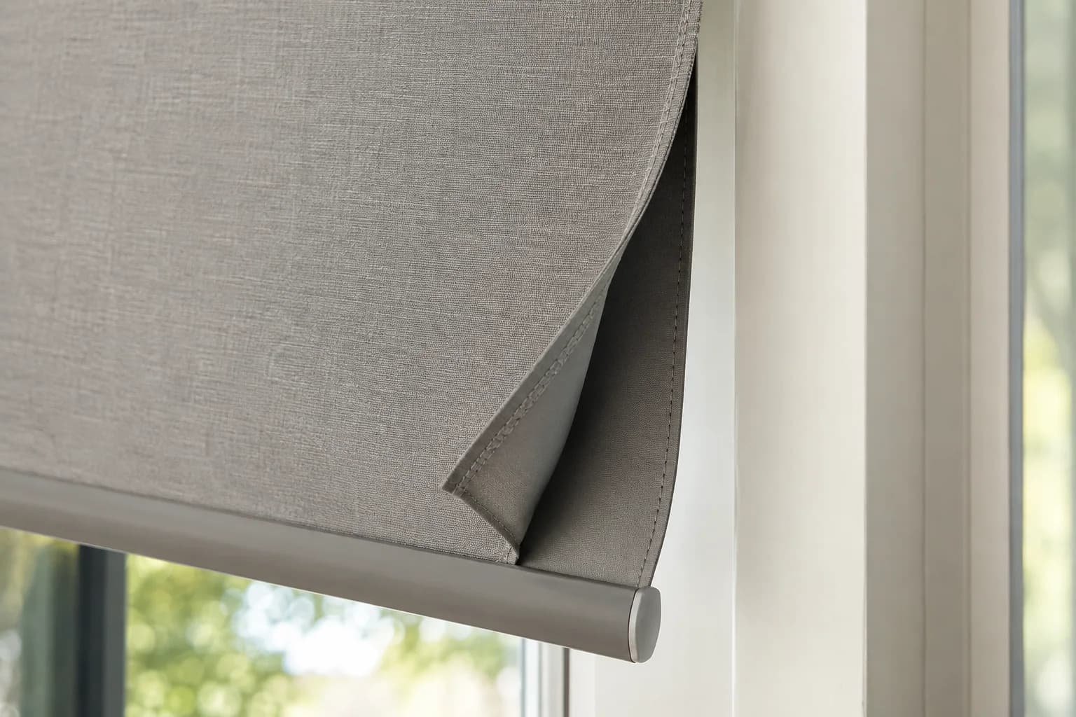 Close detail of dense blockout cloth and the bottom rail