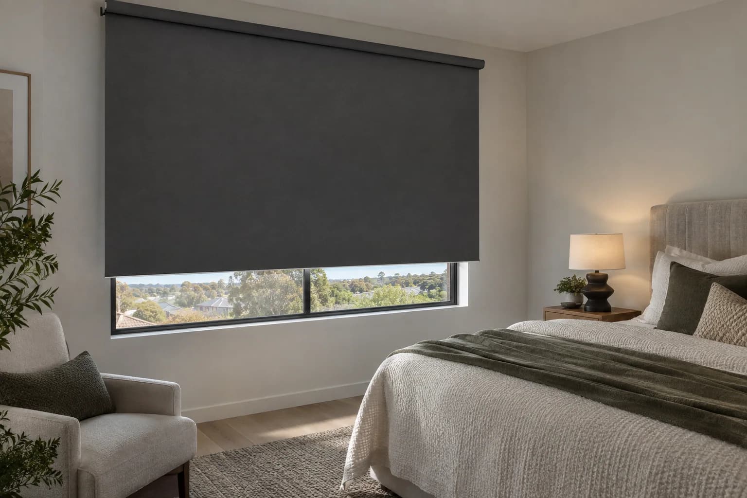 Face-fit blockout blind overlapping the window reveal