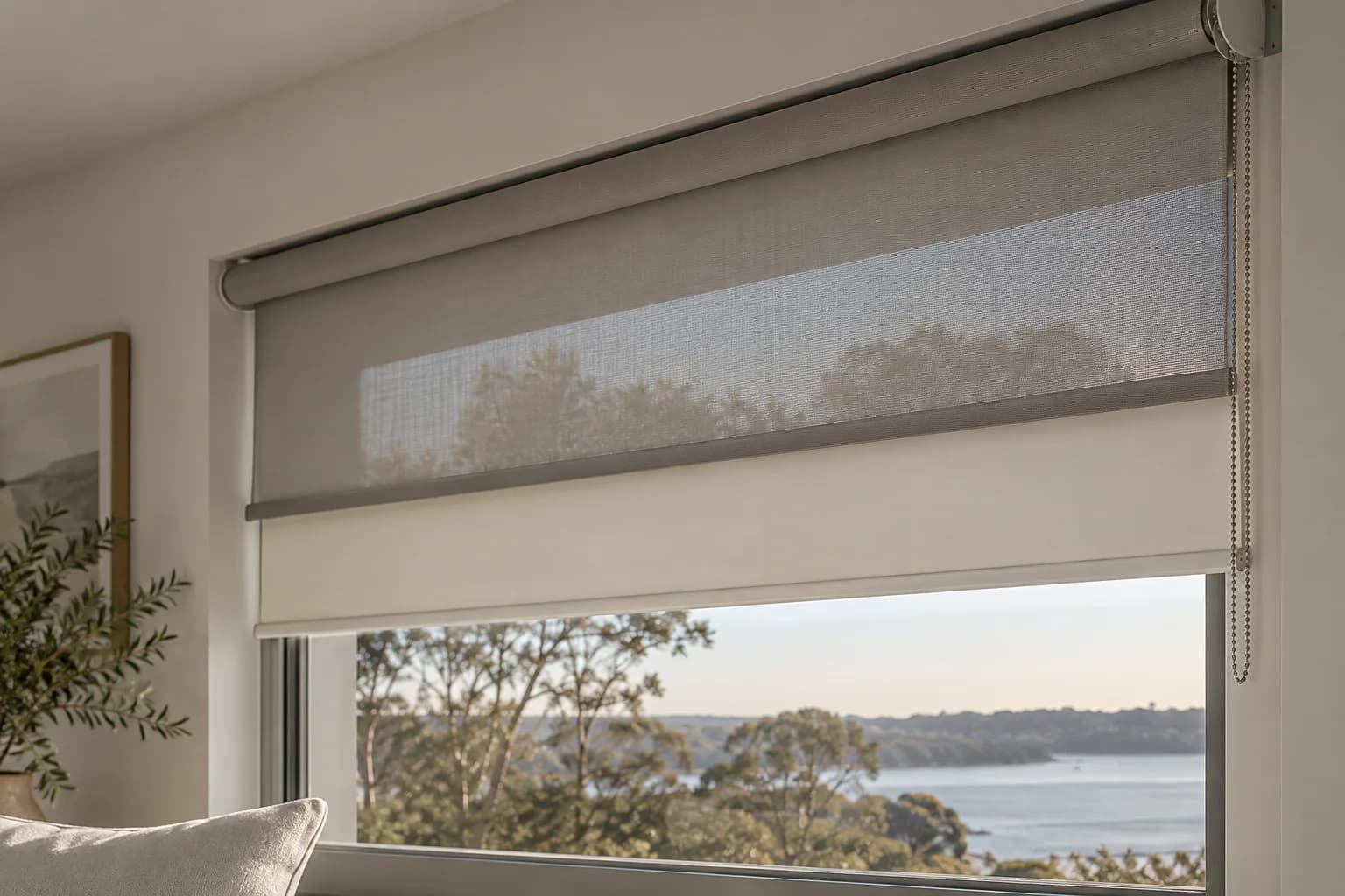 Sunscreen mesh and opaque fabric paired at one window