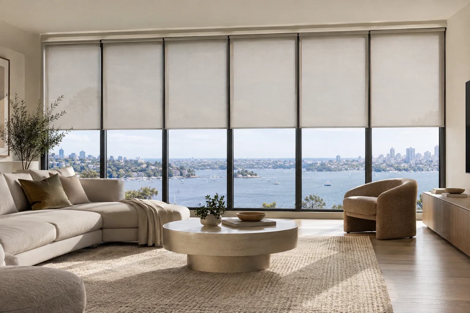 Multiple roller blinds aligned through grouped control