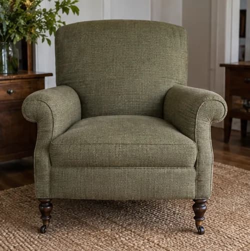 Armchair renewed in a restrained olive woven textile