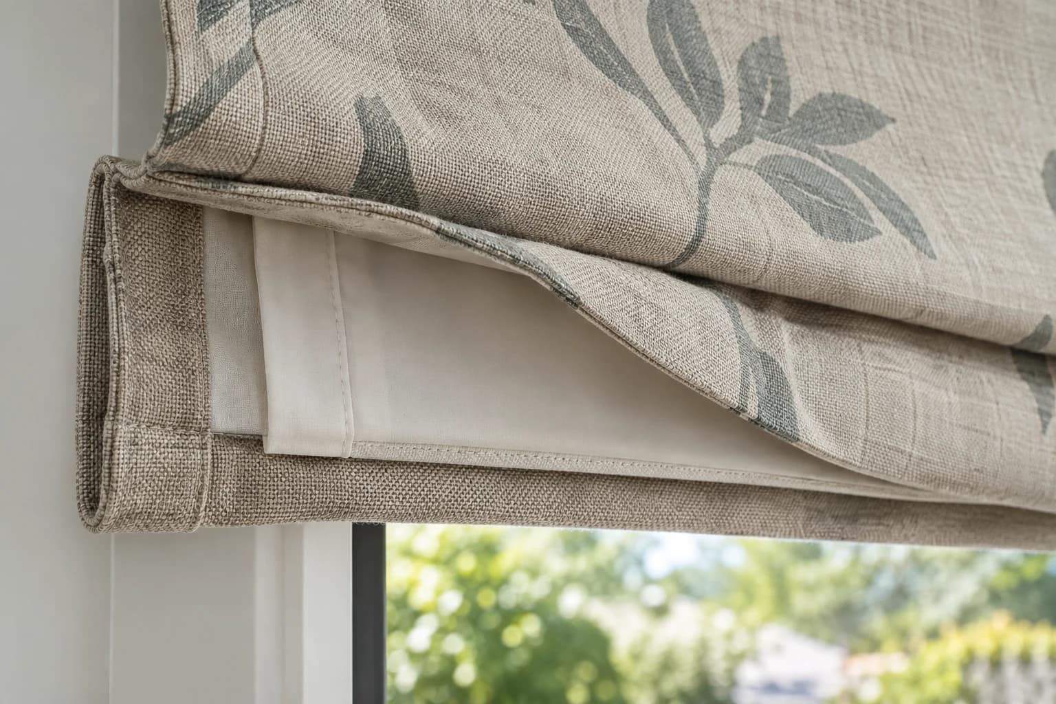 Close view of Roman blind face fabric, lining and finished edge construction.