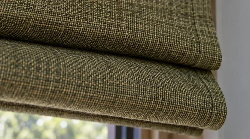 Roman blind folds showing realistic fabric weight and construction