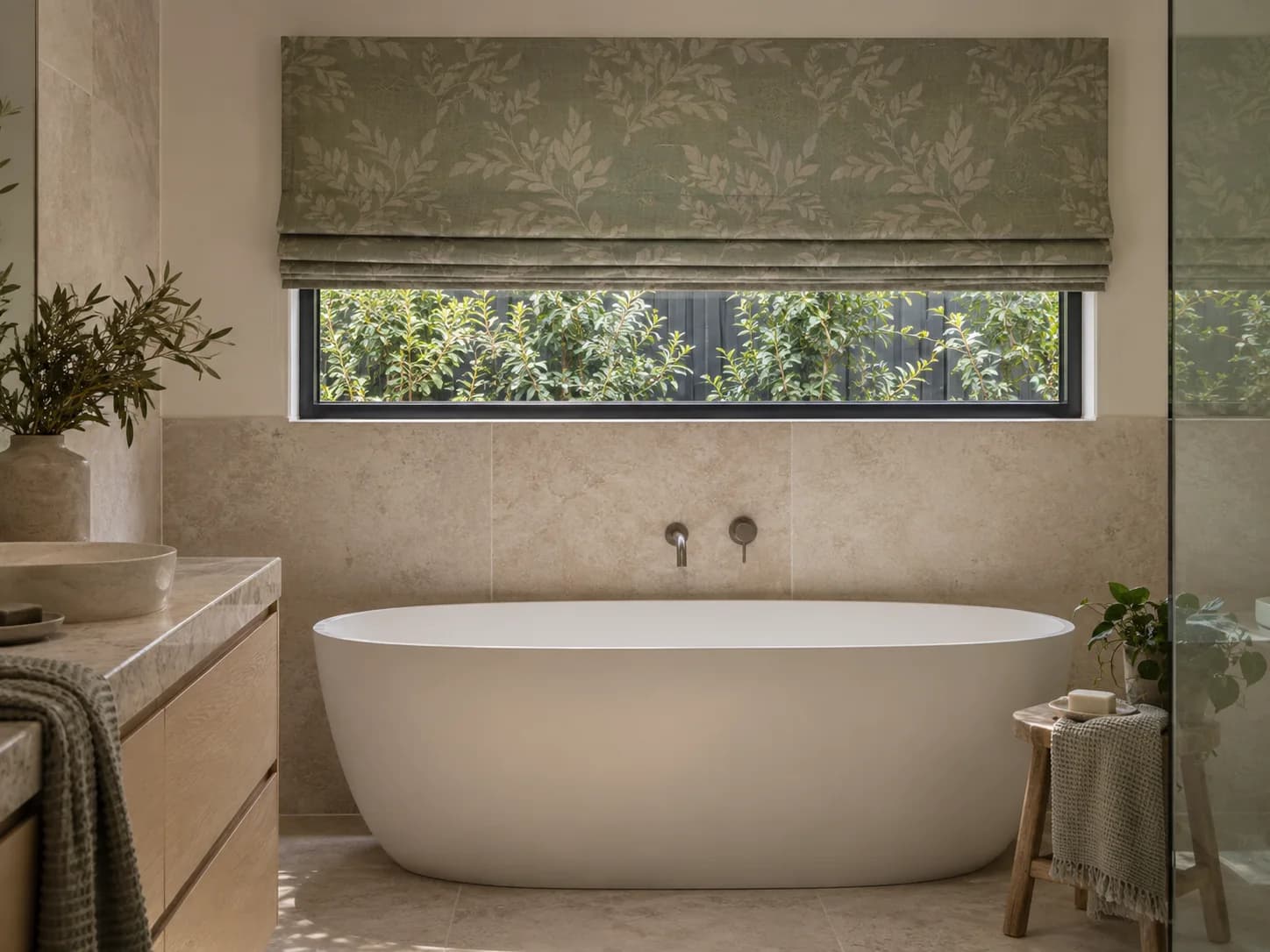 Roman blind fitted to a defined bathroom window opening