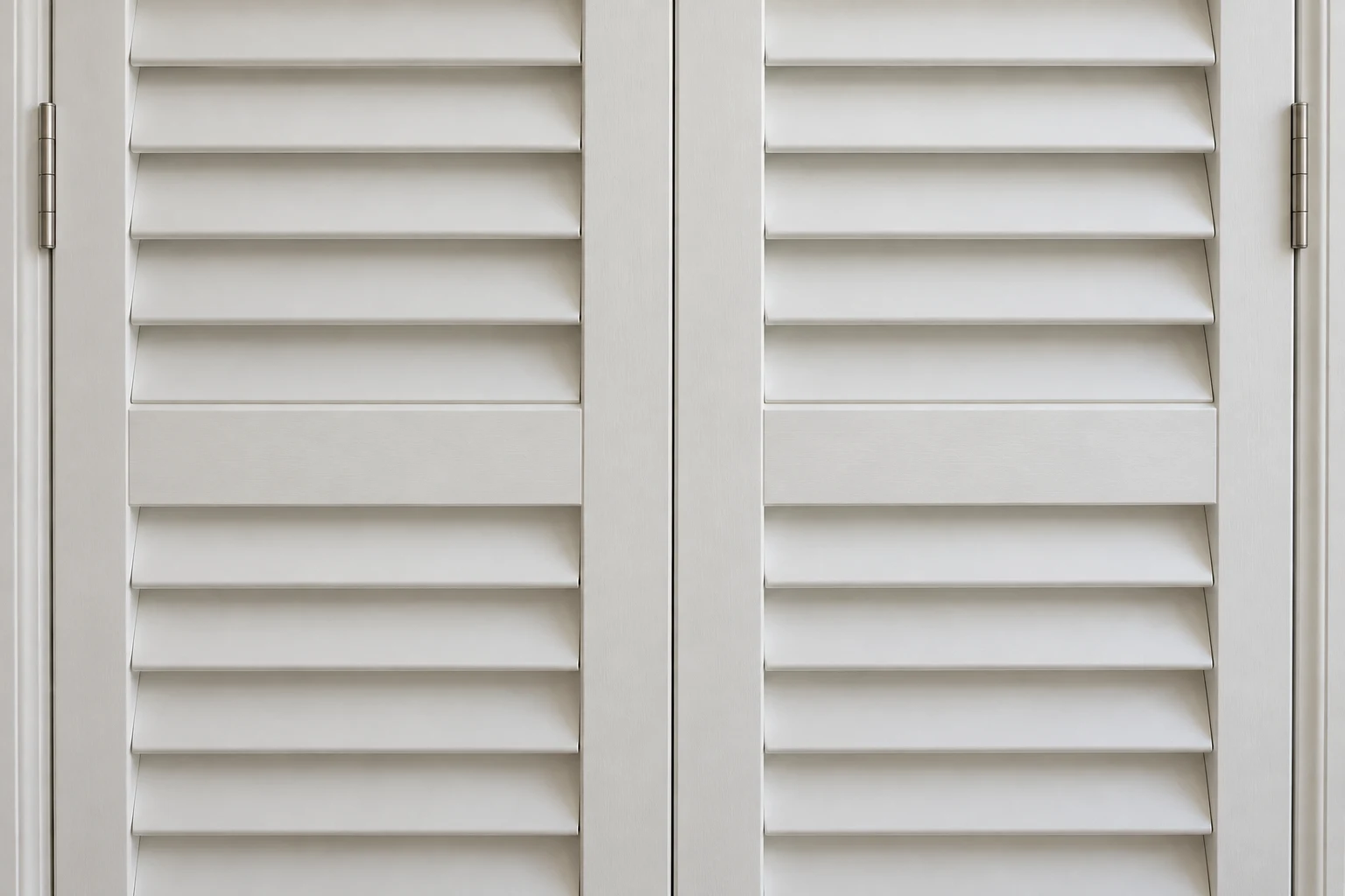 Close view of aligned plantation shutter meeting stiles and horizontal rails