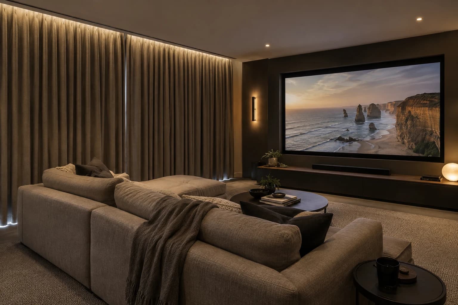 Media room with substantial dark curtains controlling light at the glazing