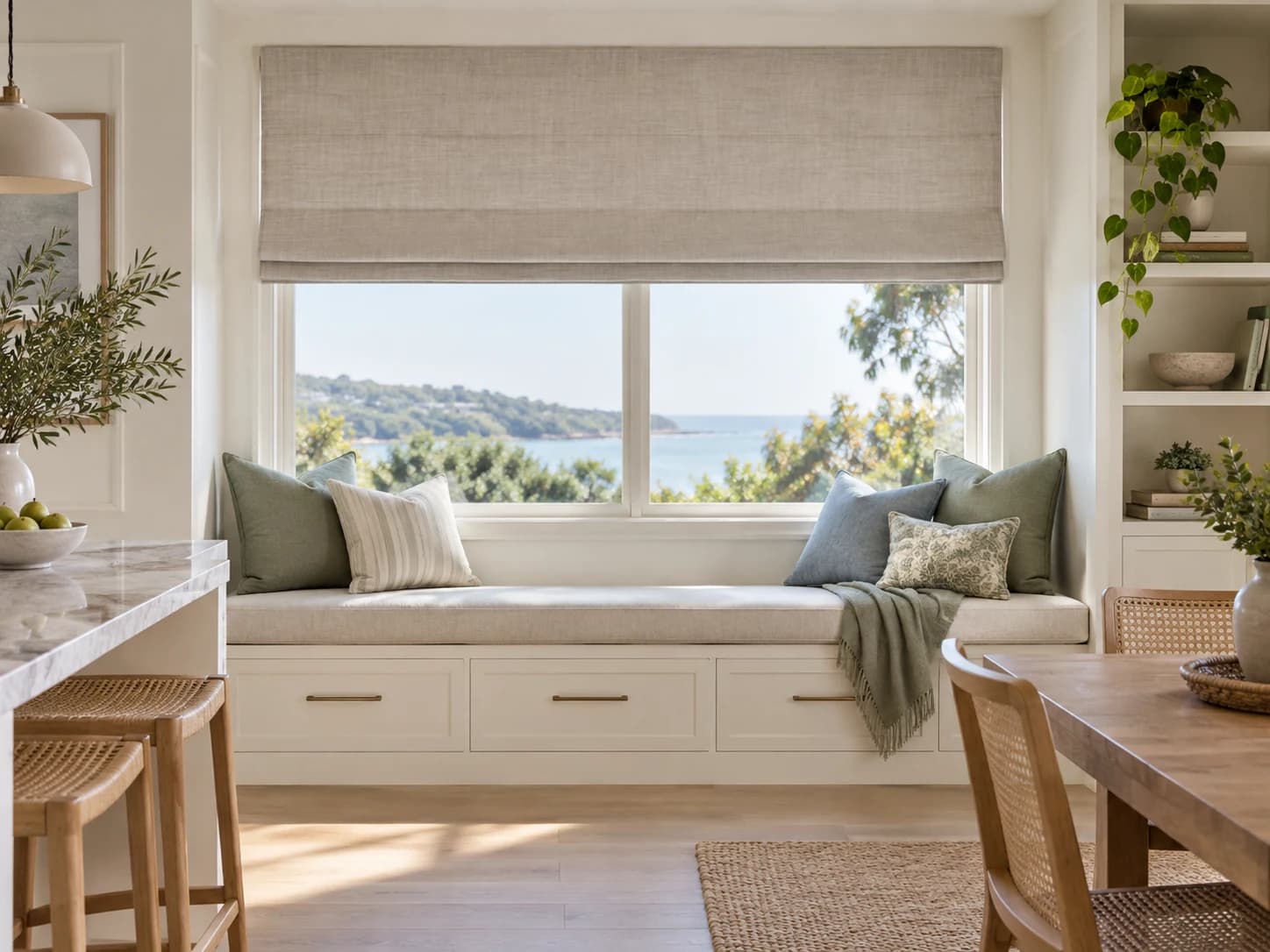 Linen Roman blind above a built-in window seat with coordinated cushions