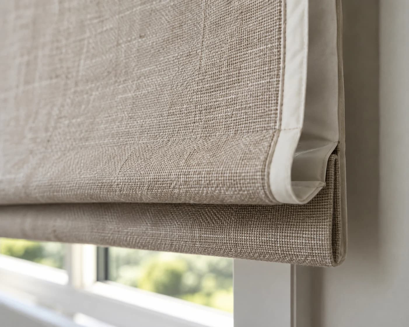 Close detail of textured Roman face fabric and pale lining edge