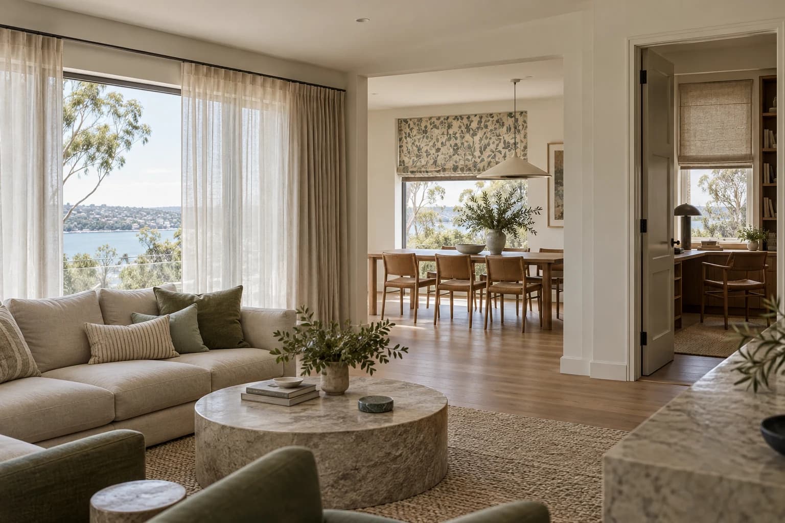 Textile-led sitting room with coordinated window treatments and soft furnishings